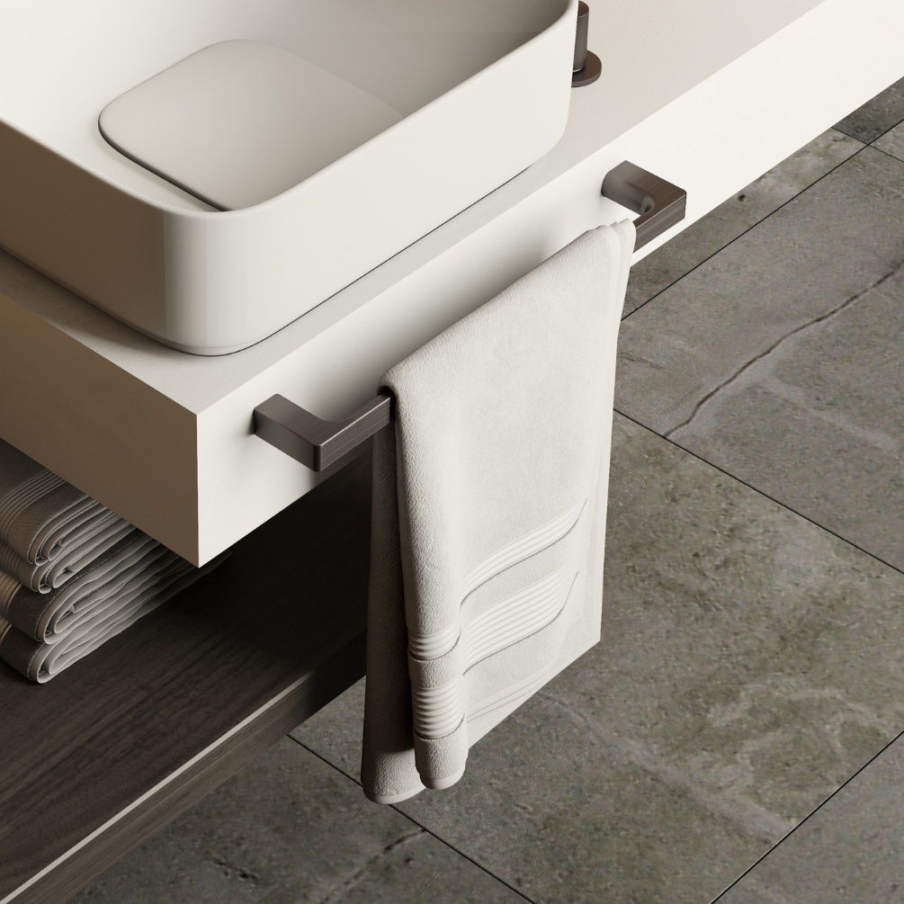 product lifestyle image of Origins Living Pirenei Gunmetal Towel Rail mounted on a table and hanging a towel PI21/35-81